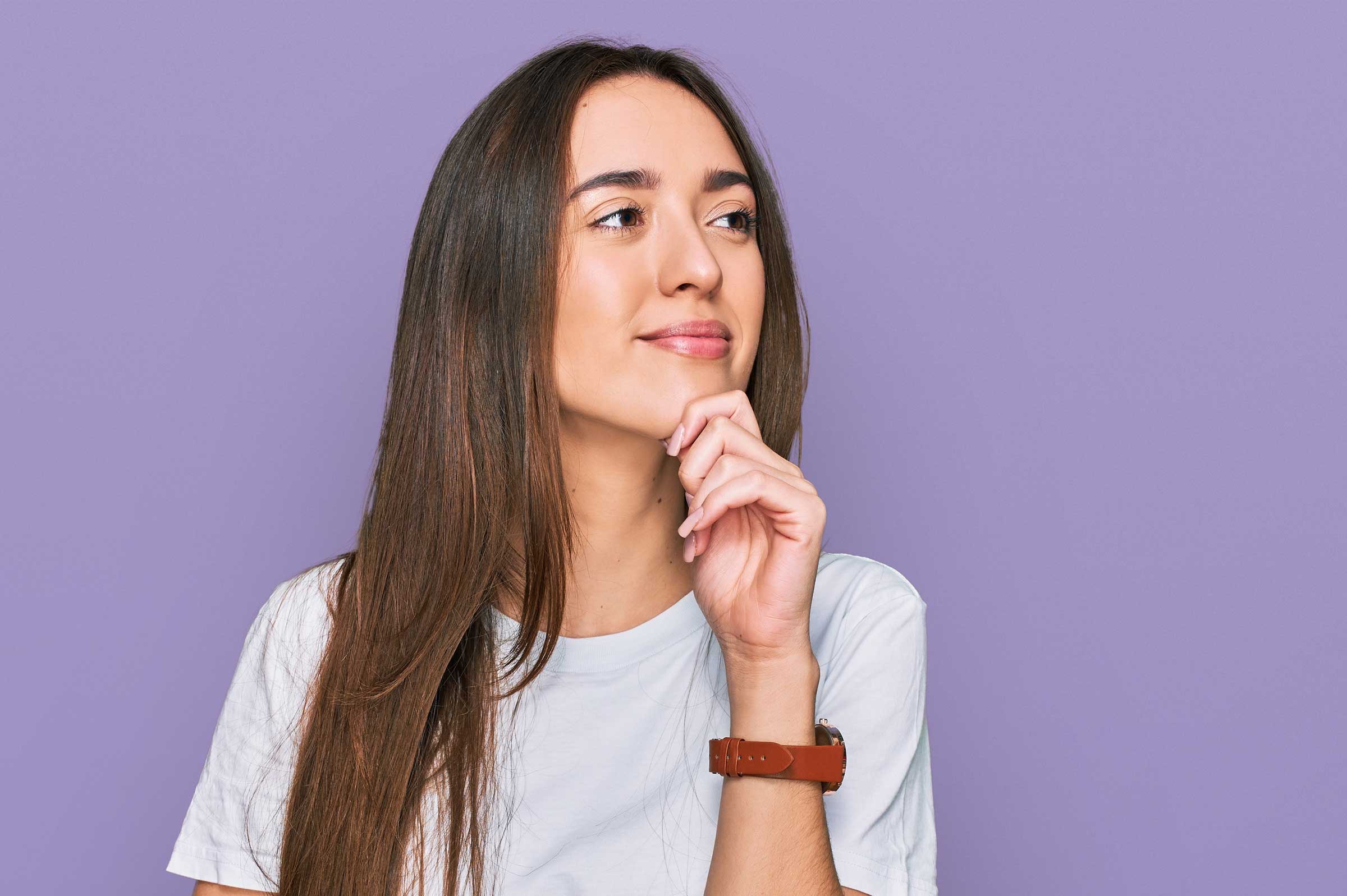 Woman thinking about Open Enrollment