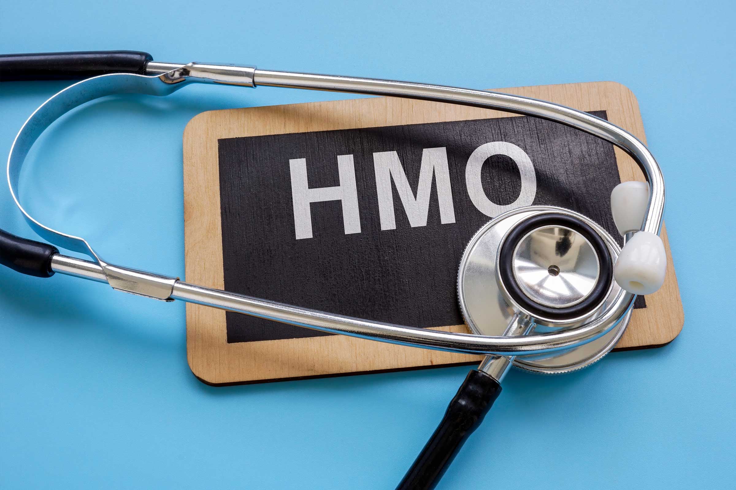 An HMO clipboard and a physician's stethoscope