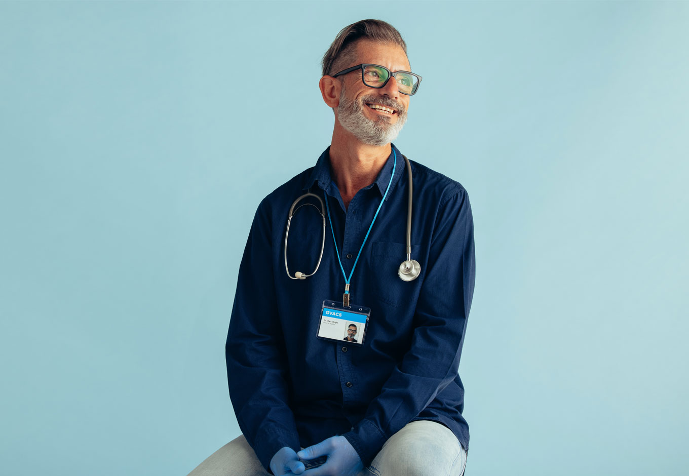 Doctor sitting on a stool